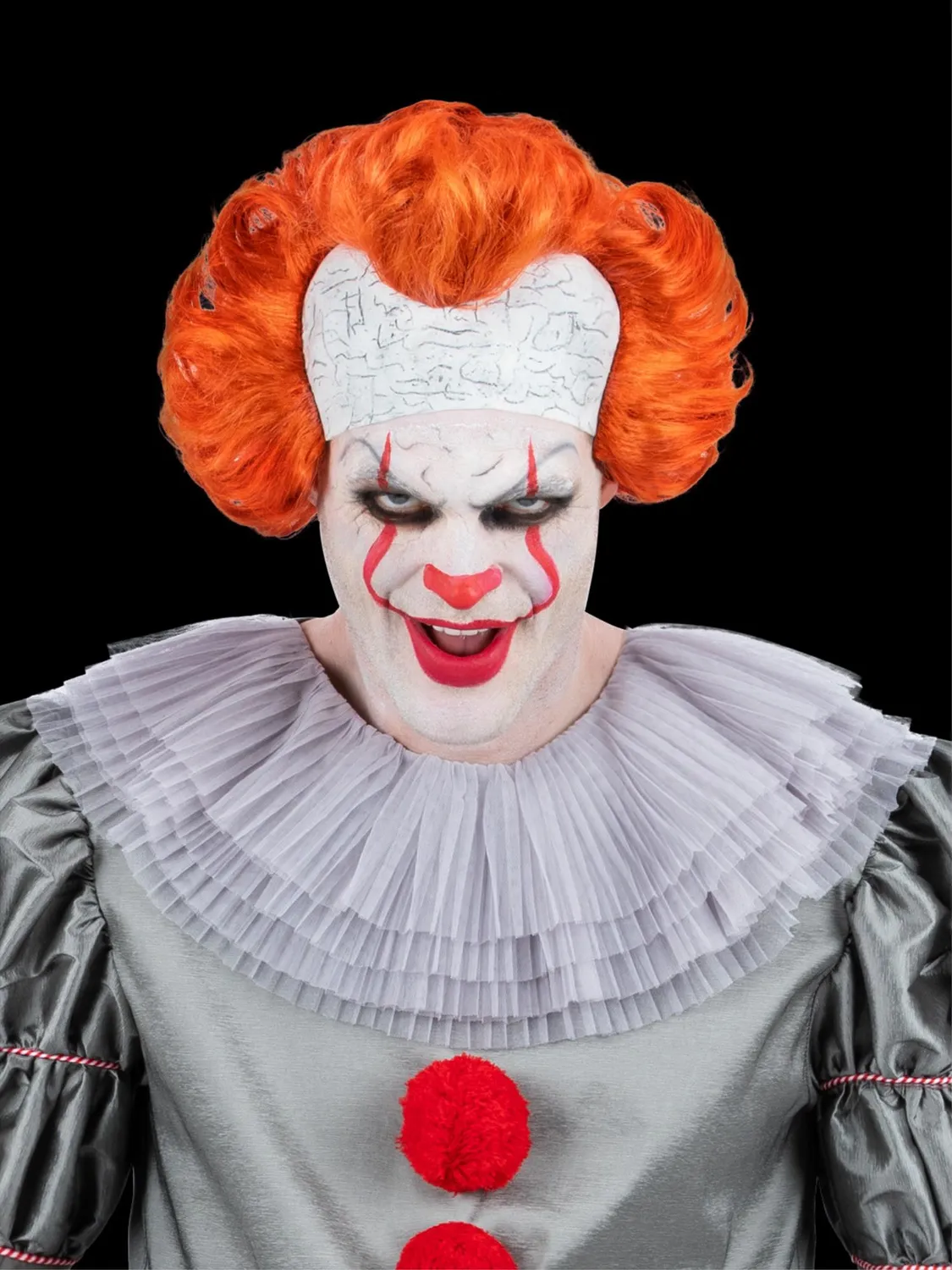 Smiffys IT Chapter 2 Pennywise parrucca arancione lattice